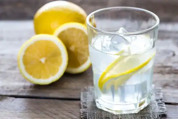 Hydration: The Secret Ingredient for a Toned Stomach and Enhanced Fitness 2 Image of lemon water to aid hydration Sunbury-on-Thames